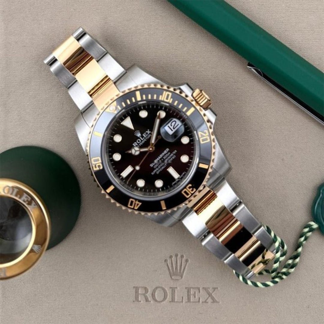 RolexSubmarinerSilverGoldBlackMetalWatch1080X1080_1.jpg